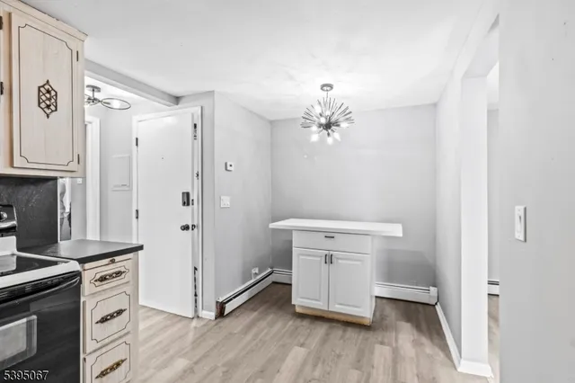 a bathroom with a sink a mirror and vanity