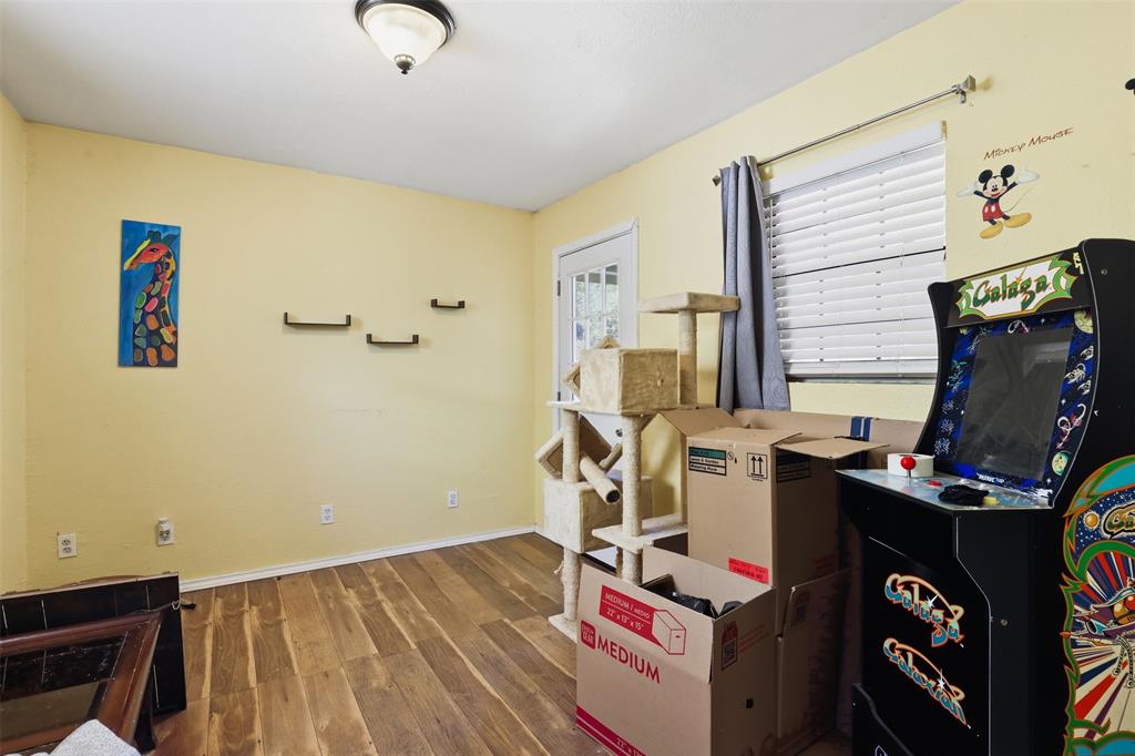 500 West Rucker Street Granbury, TX 76048 - Photo 26 of 35 a room with storage and utility