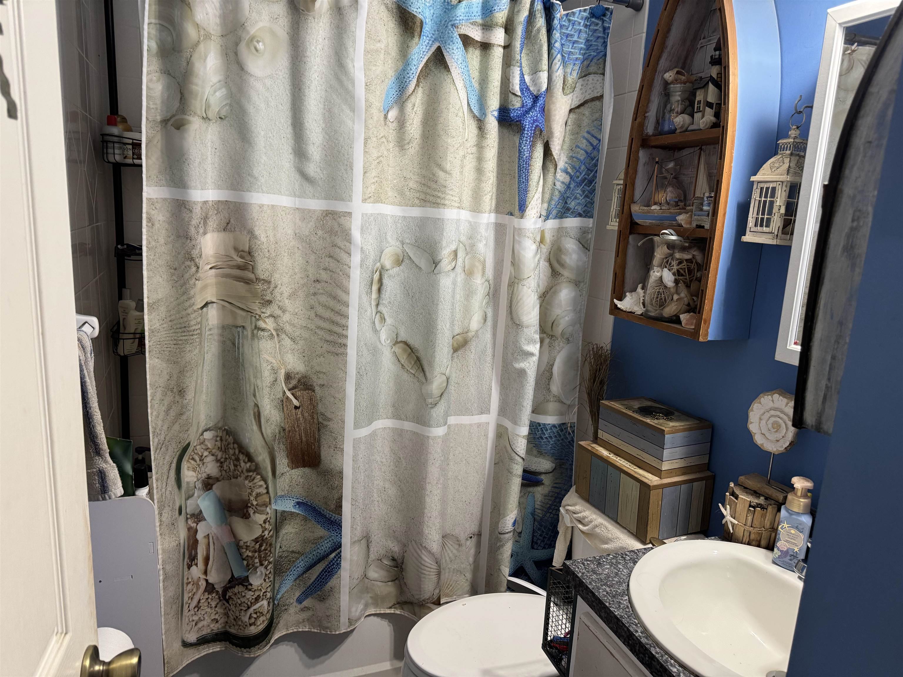 1134 Coral Farms Road Florahome, FL 32140 - Photo 16 of 33 a white toilet sitting next to a bathroom sink