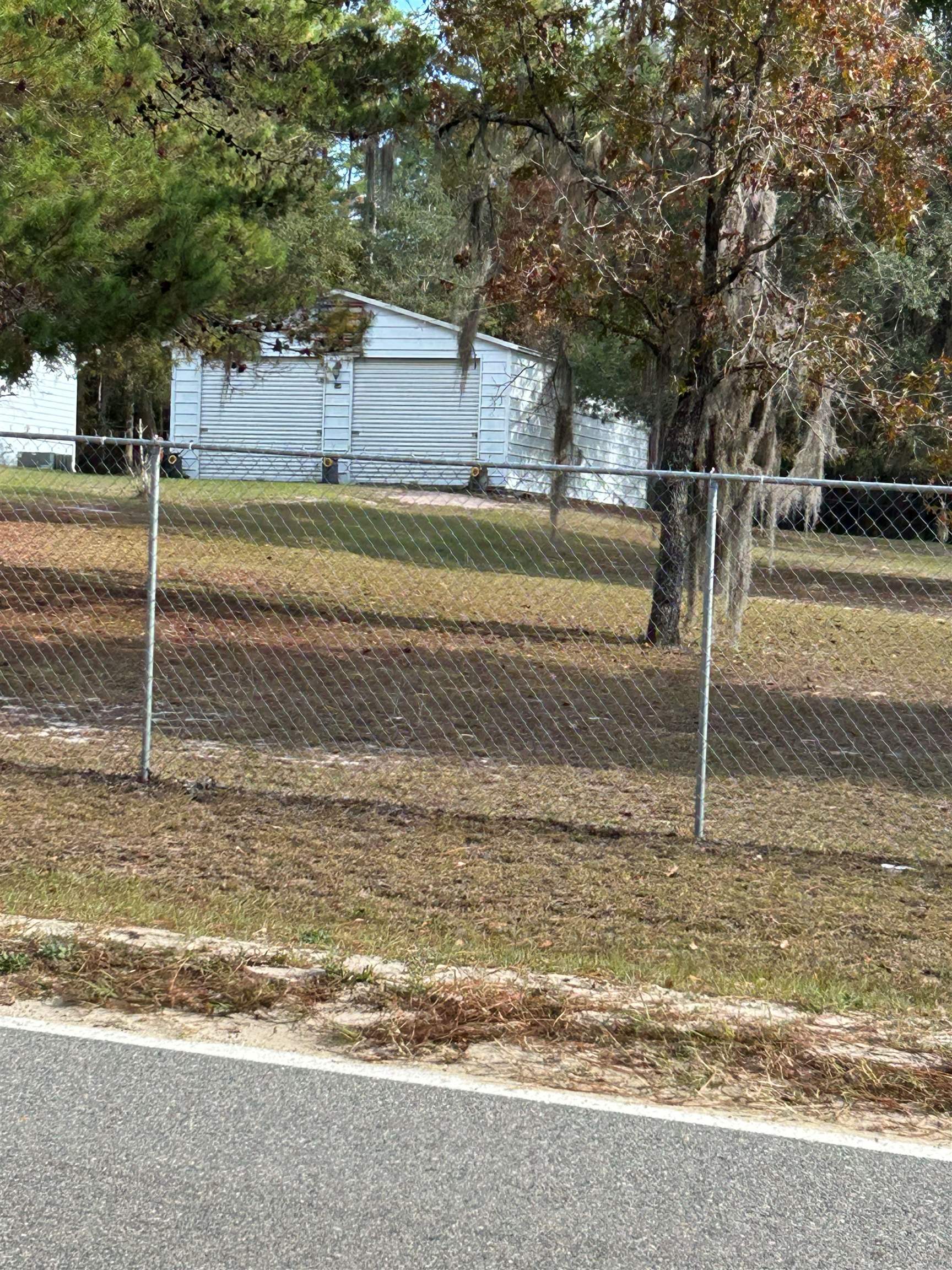 1134 Coral Farms Road Florahome, FL 32140 - Photo 28 of 33 a view of a house with a yard