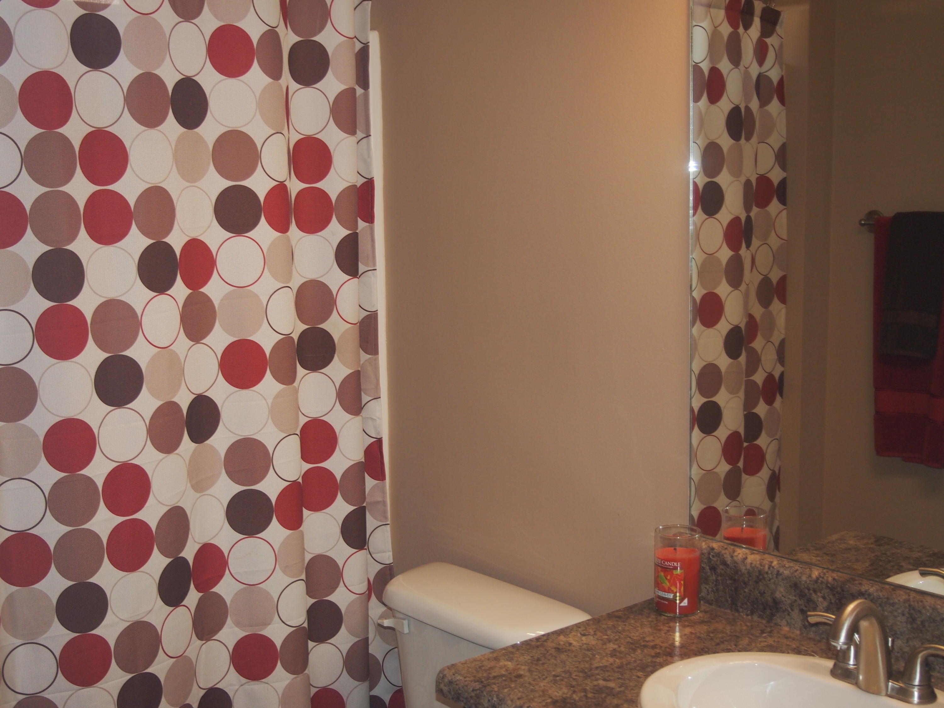 9273 Sundance Court Navarre, FL 32566 - Photo 22 of 33 a bathroom with a toilet and a sink