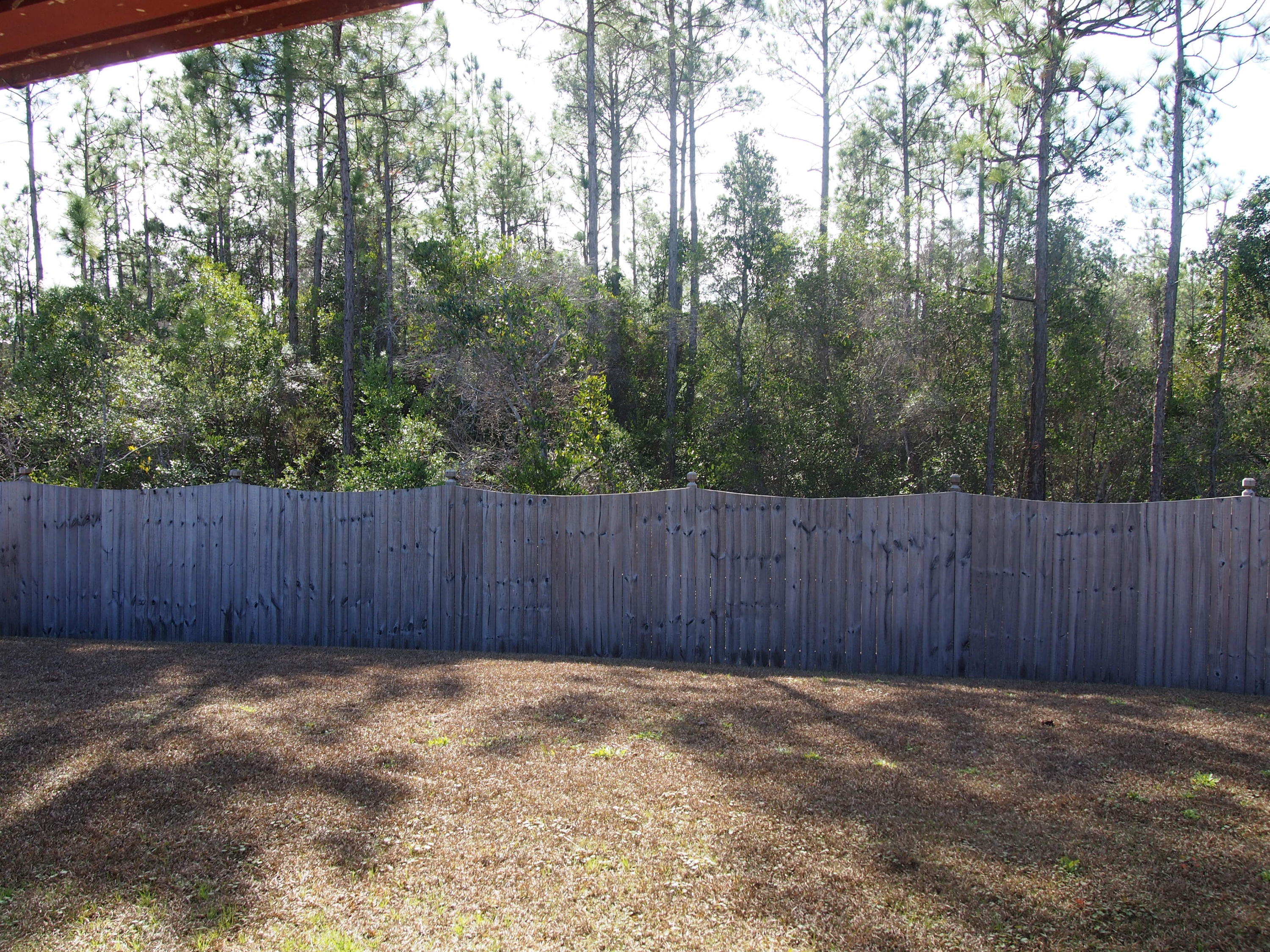 9273 Sundance Court Navarre, FL 32566 - Photo 32 of 33 a view of small yard