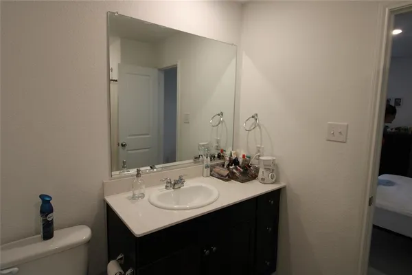 a bathroom with a sink and a toilet