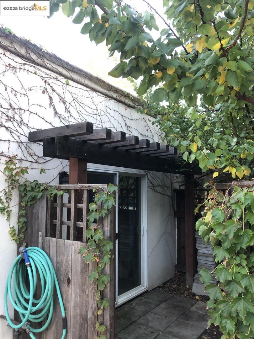 4088 Hackberry Place Davis, CA 95618 - Photo 13 of 58 a front view of small house with yard and seating area
