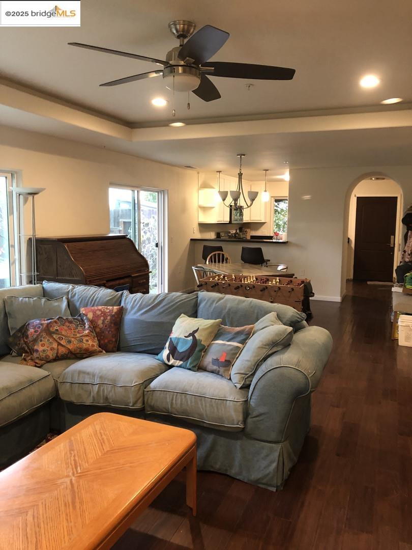 4088 Hackberry Place Davis, CA 95618 - Photo 31 of 58 a living room with furniture and a chandelier