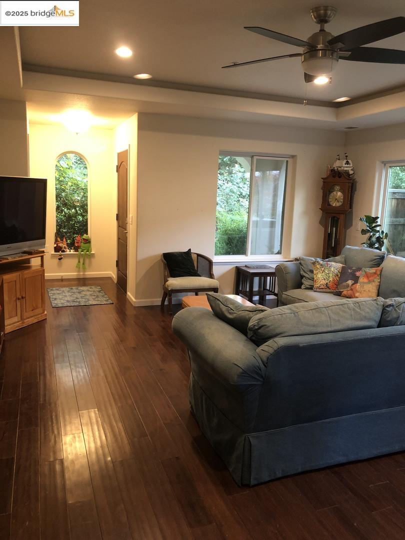 4088 Hackberry Place Davis, CA 95618 - Photo 33 of 58 a living room with furniture and a flat screen tv