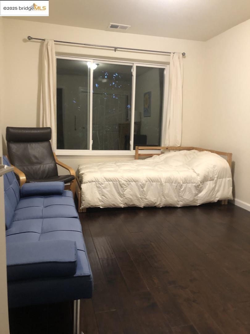 4088 Hackberry Place Davis, CA 95618 - Photo 36 of 58 a bedroom with a bed and a window