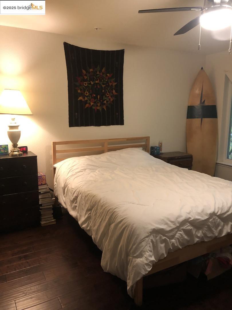 4088 Hackberry Place Davis, CA 95618 - Photo 47 of 58 a bedroom with a bed and a painting on the wall