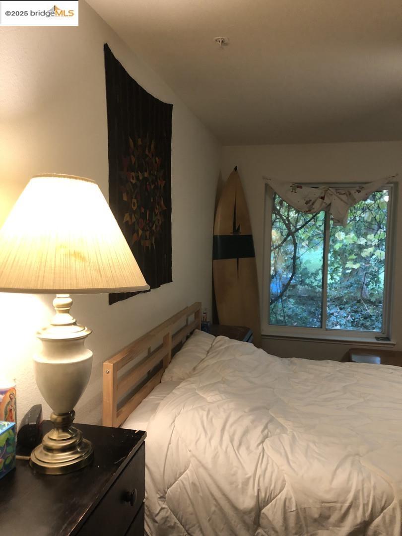4088 Hackberry Place Davis, CA 95618 - Photo 49 of 58 a bathroom with a toilet sink and mirror