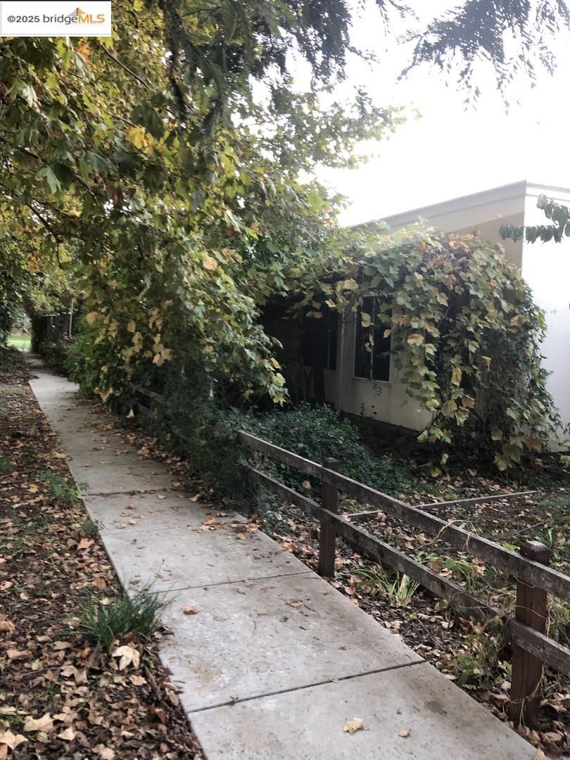 4088 Hackberry Place Davis, CA 95618 - Photo 8 of 58 a view of a pathway with a yard