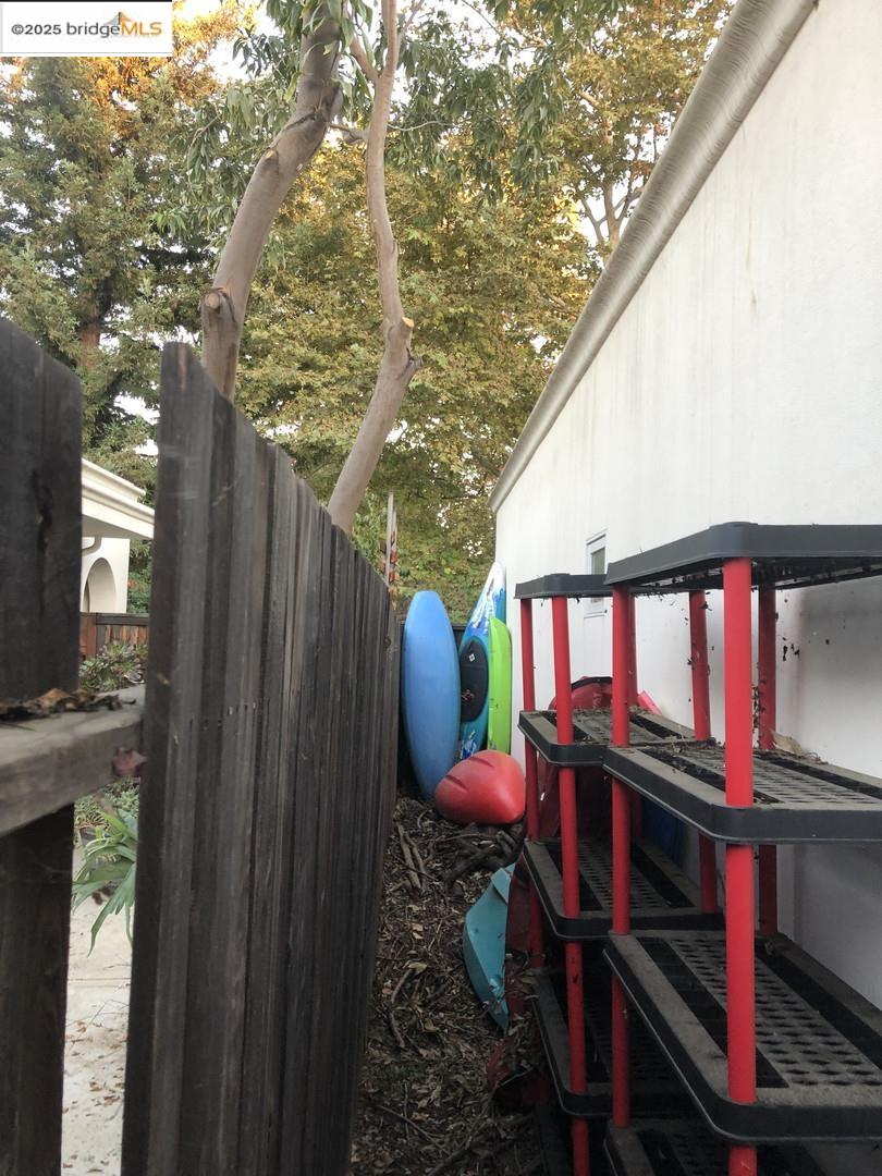 4088 Hackberry Place Davis, CA 95618 - Photo 9 of 58 a backyard of a house with seating space and trees