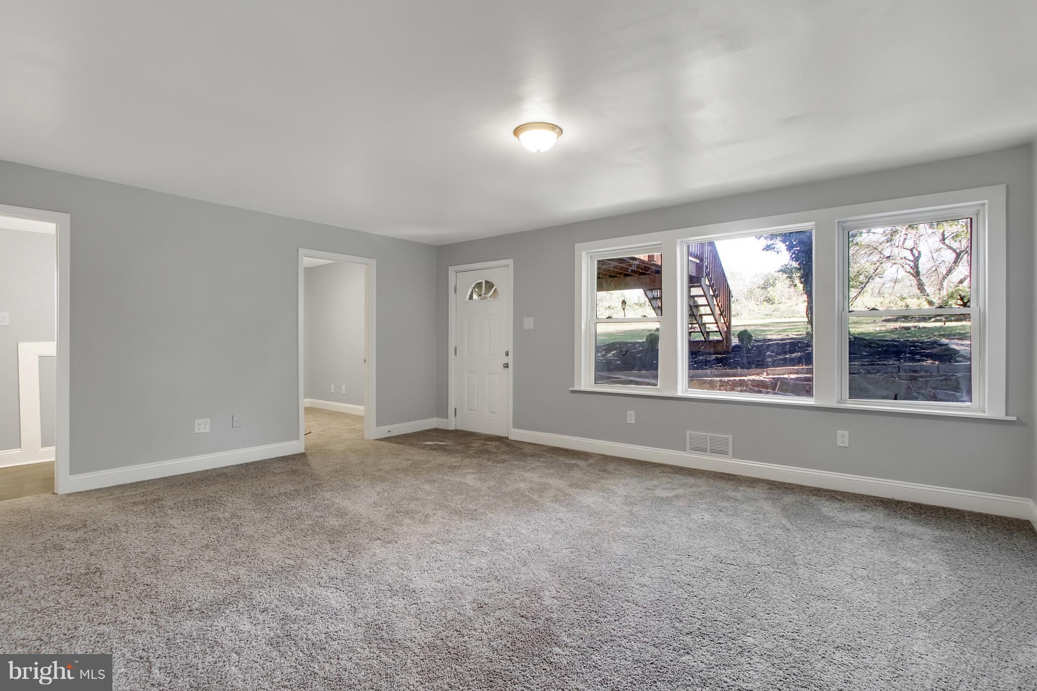 1807 Jug Road Dover, PA 17315 - Photo 2 of 27 an empty room with windows