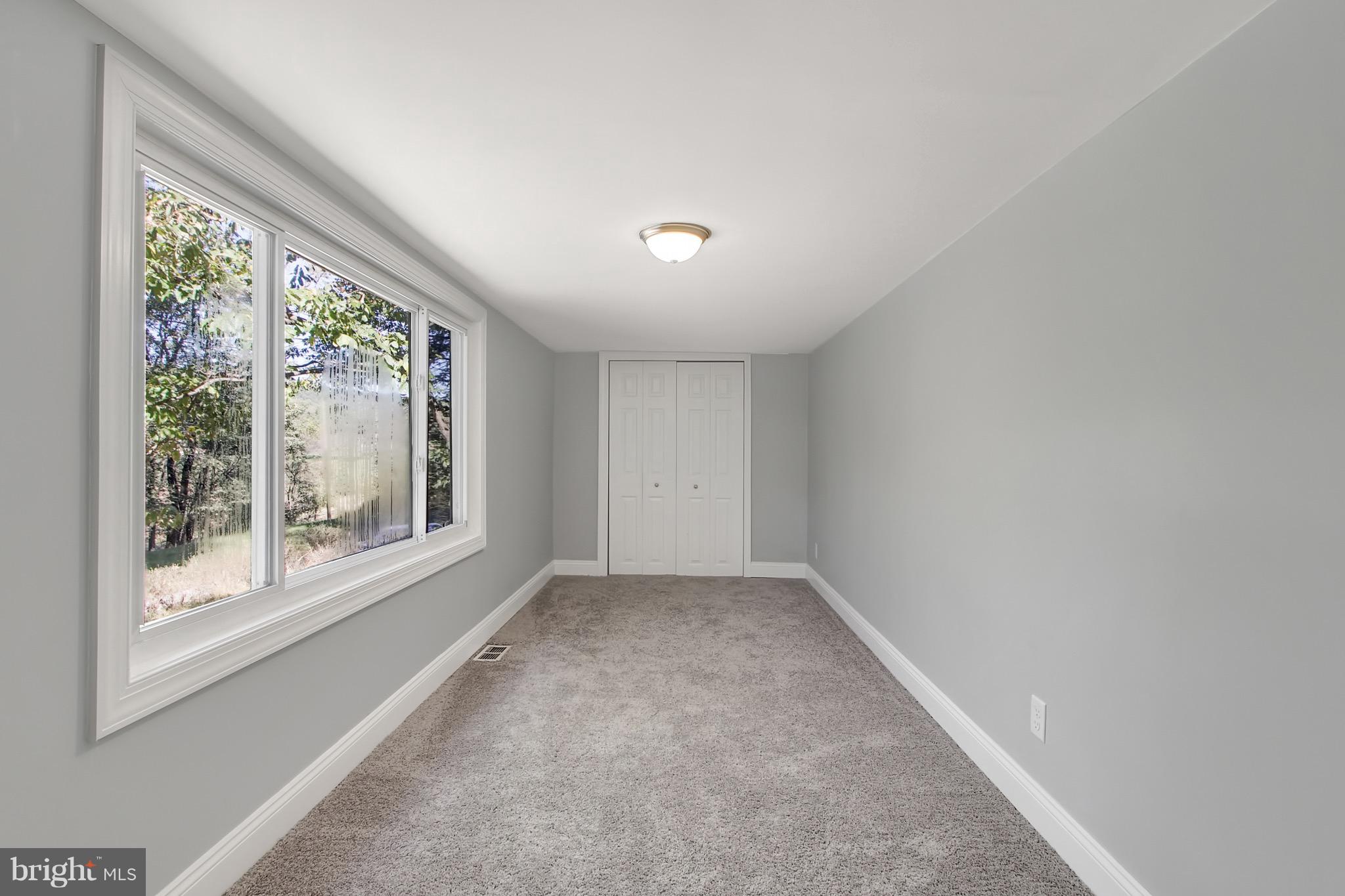 1807 Jug Road Dover, PA 17315 - Photo 11 of 27 a view of an empty room with a window