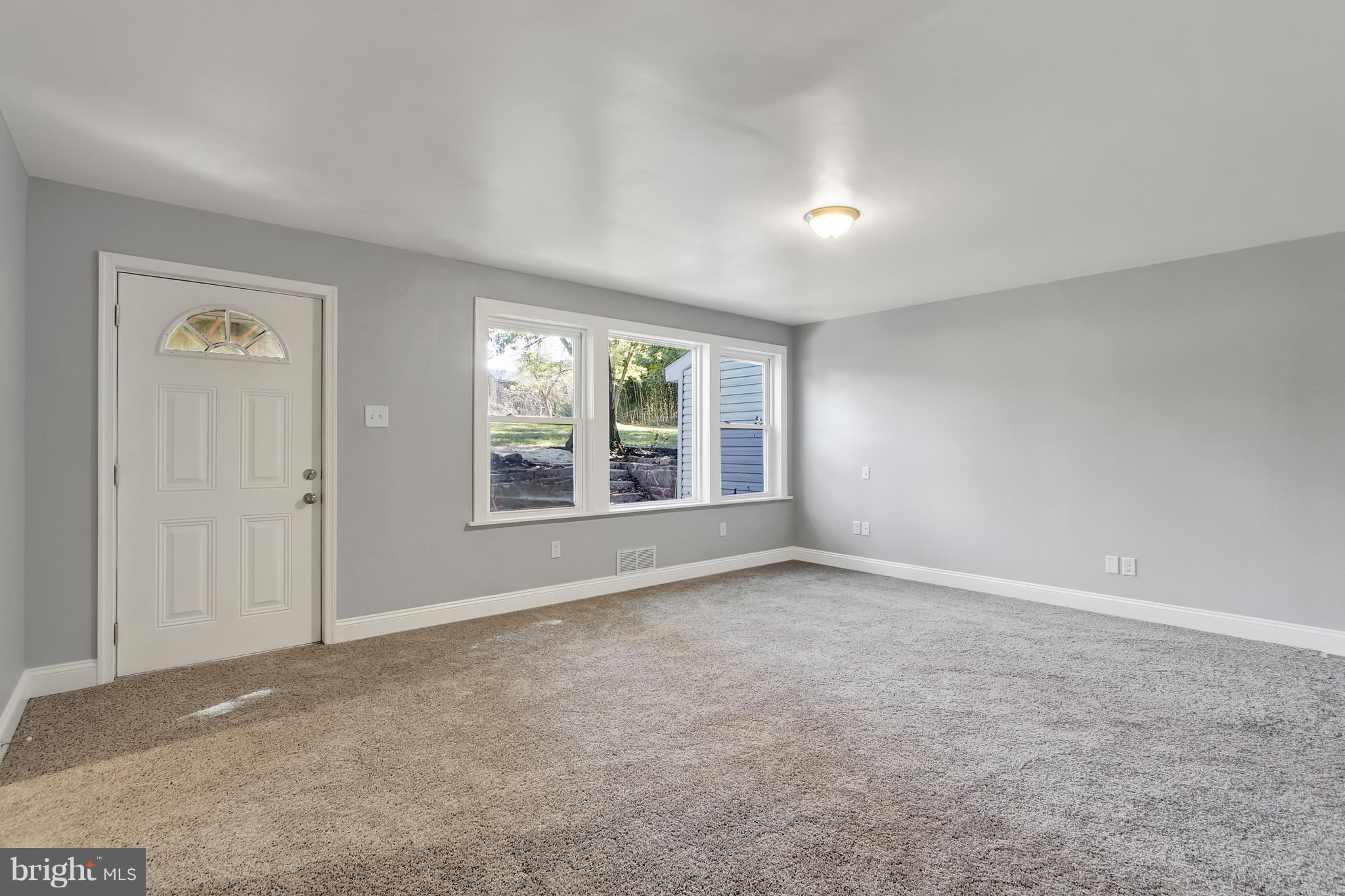1807 Jug Road Dover, PA 17315 - Photo 3 of 27 an empty room with windows