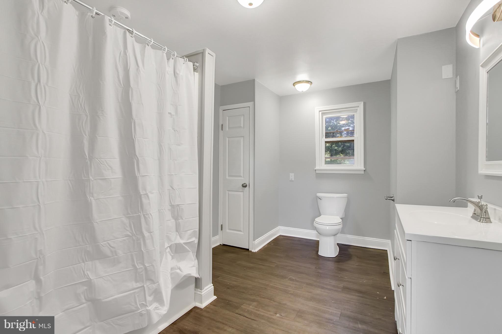 1807 Jug Road Dover, PA 17315 - Photo 22 of 27 a bathroom with a sink a toilet and shower