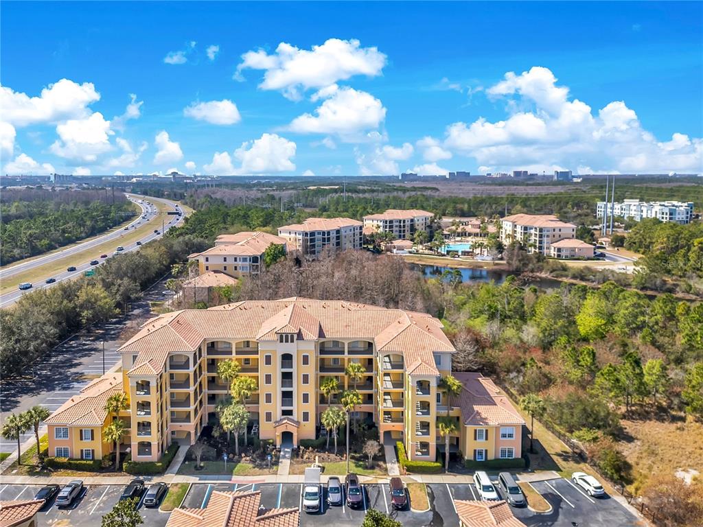 8601 Worldquest Boulevard, Unit 3108 Orlando, FL 32821 - Photo 1 of 24 a view of a city with tall buildings