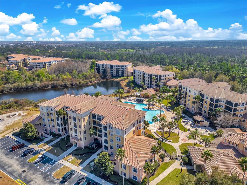 8601 Worldquest Boulevard, Unit 3108 Orlando, FL 32821 - Photo 21 of 24 an aerial view of multiple house