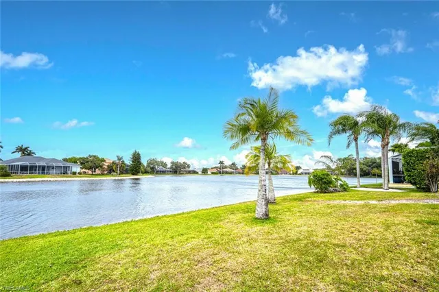 a view of a lake with a big yard