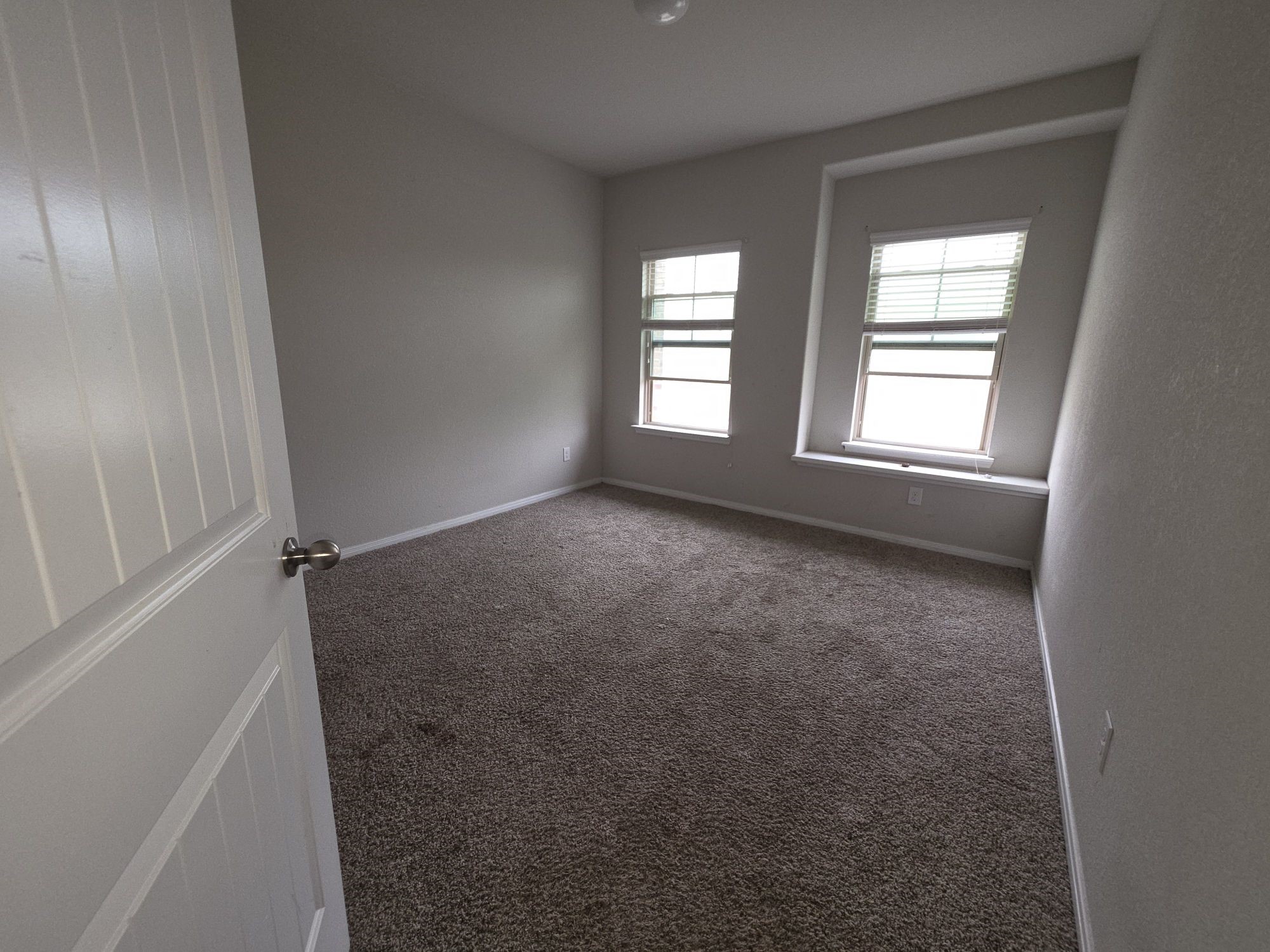 3421 Orch Brg Lane Rosenberg, TX 77471 - Photo 11 of 12 an empty room with windows