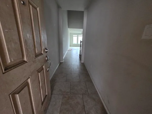 a hallway with stairs