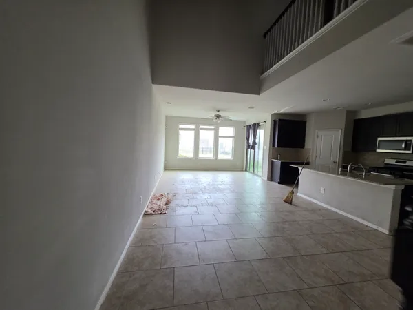 a view of livingroom with furniture window and wooden floor