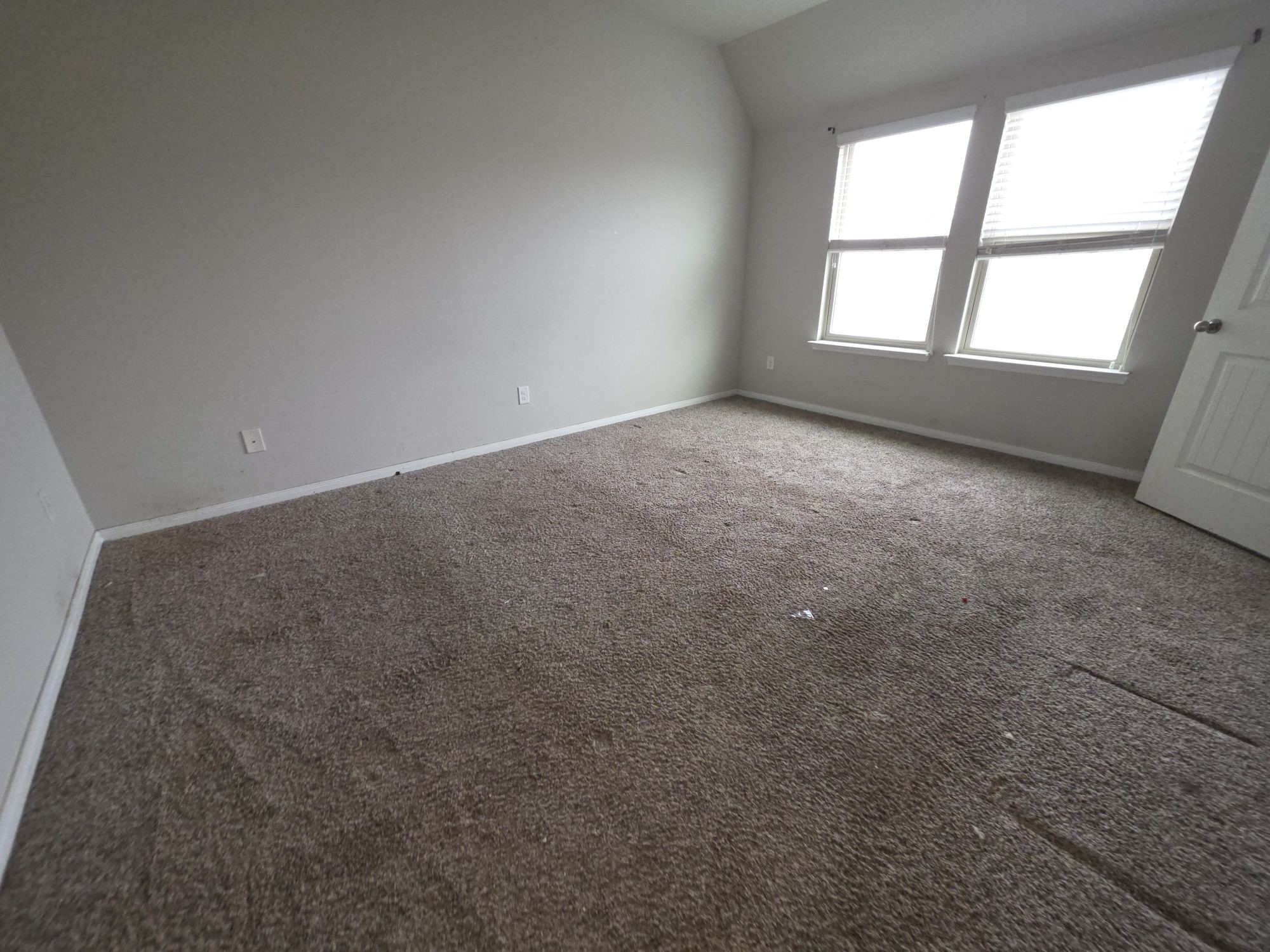 3421 Orch Brg Lane Rosenberg, TX 77471 - Photo 6 of 12 an empty room with a empty space and window