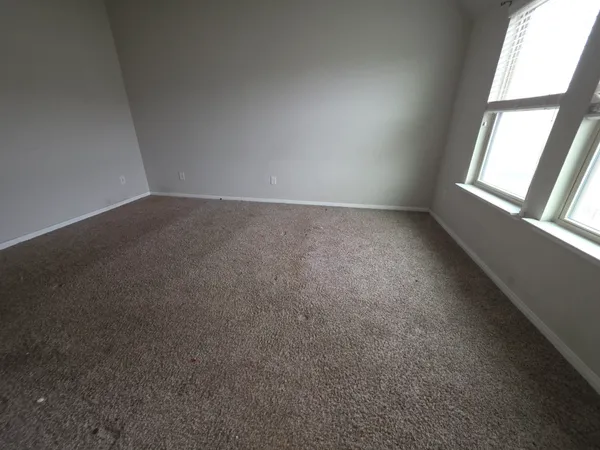 an empty room with a window