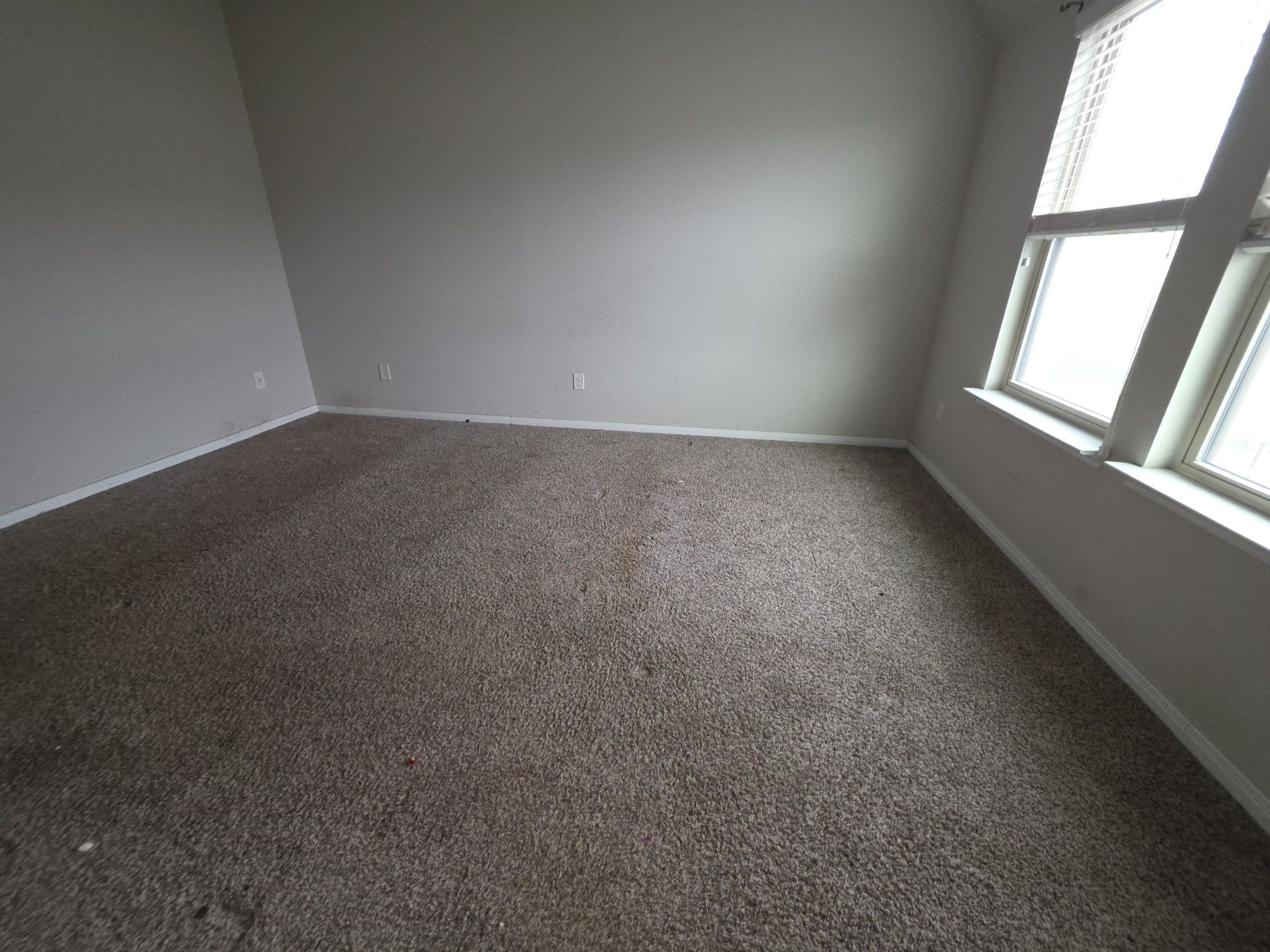 3421 Orch Brg Lane Rosenberg, TX 77471 - Photo 9 of 12 an empty room with a window
