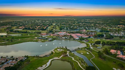 a view of a lake with a city