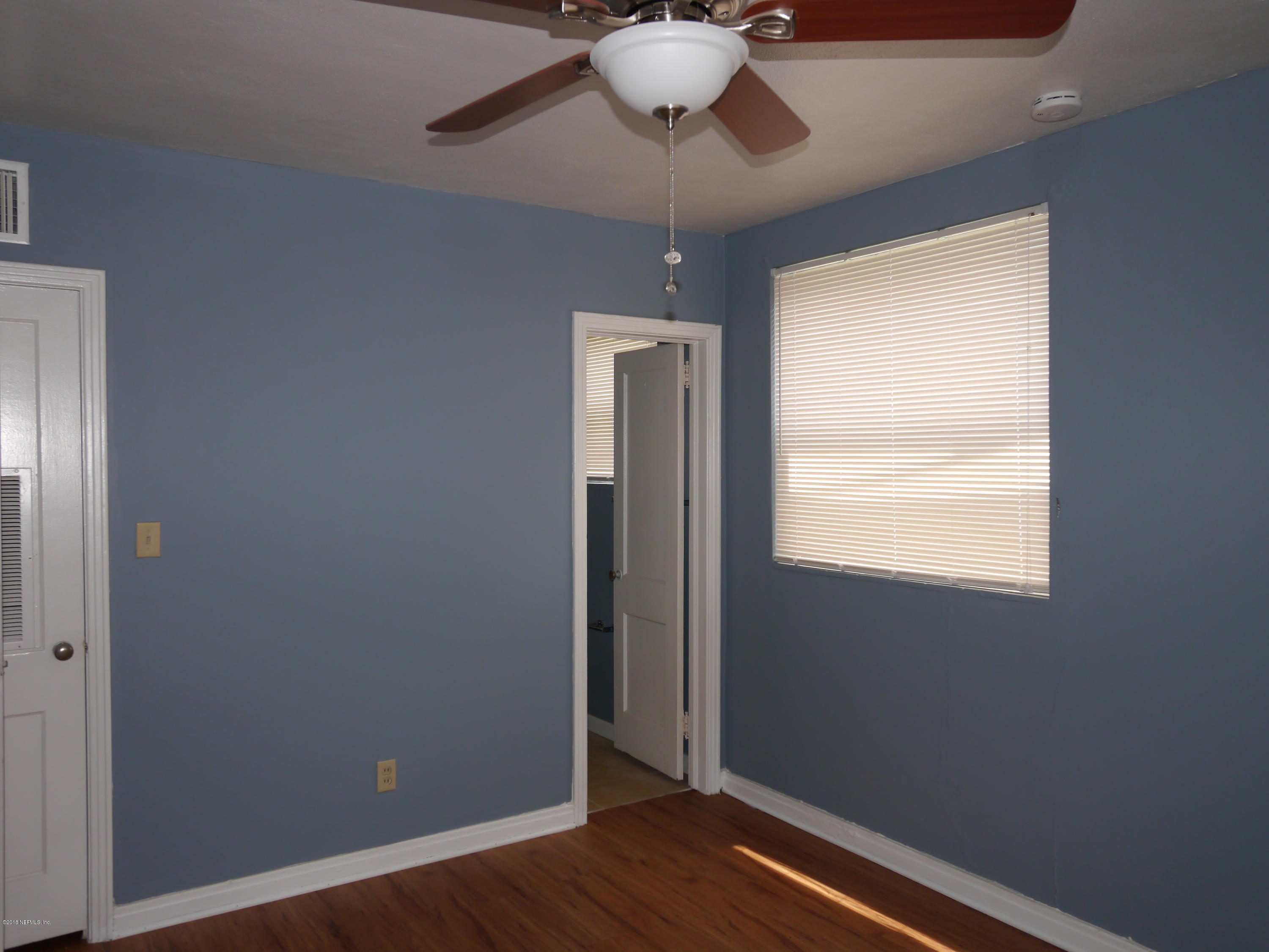 2153 Post Street, Unit 4 Jacksonville, FL 32204 - Photo 12 of 17 a view of an empty room with a window