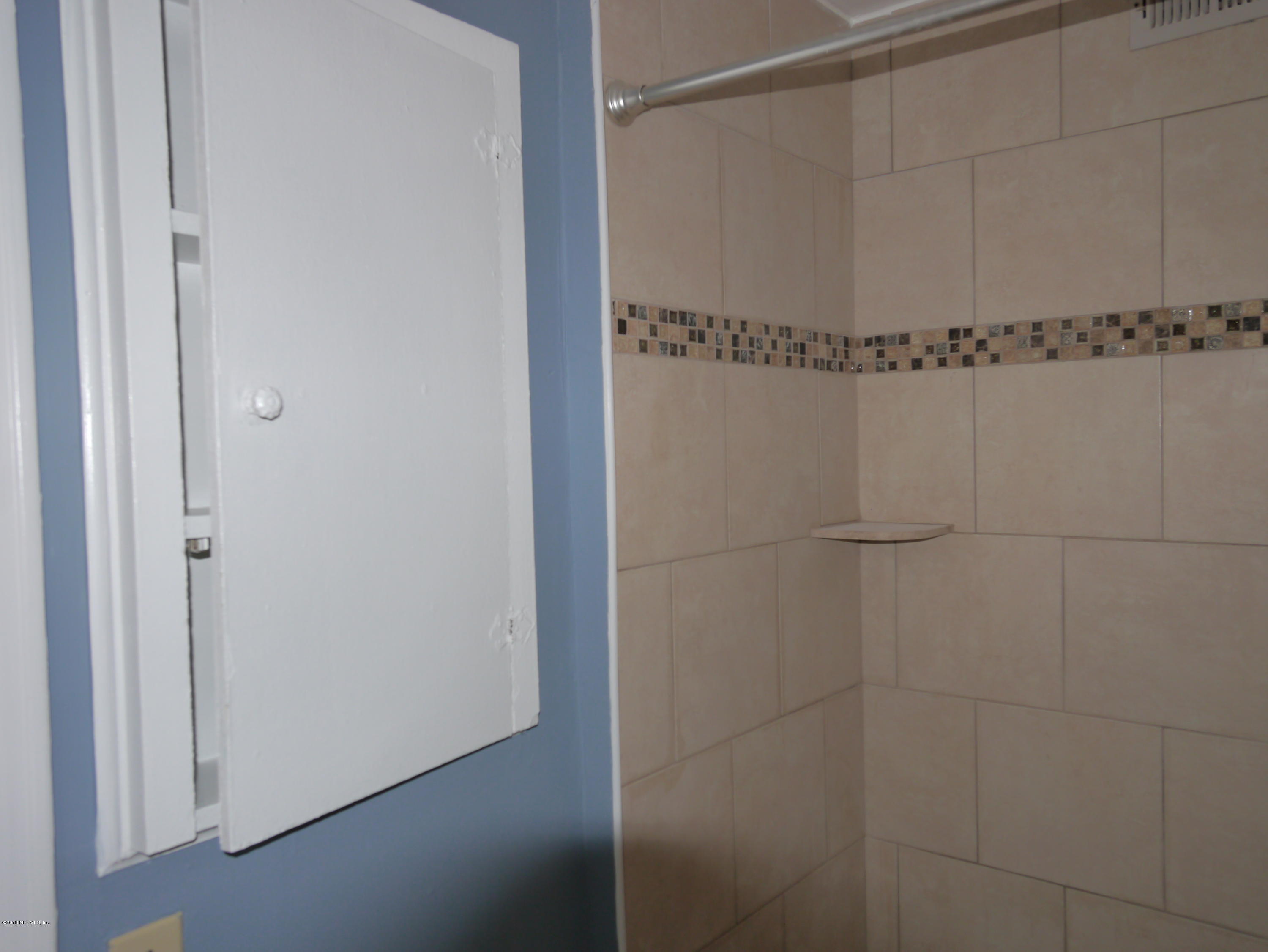 2153 Post Street, Unit 4 Jacksonville, FL 32204 - Photo 14 of 17 a bathroom with a shower