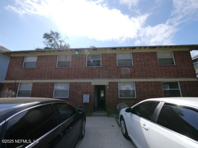 2153 Post Street, Unit 4 Jacksonville, FL 32204 - Photo 17 of 17 a view of roof deck with couches and potted plants