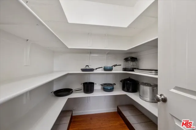 a bathroom with a double vanity sink and mirror