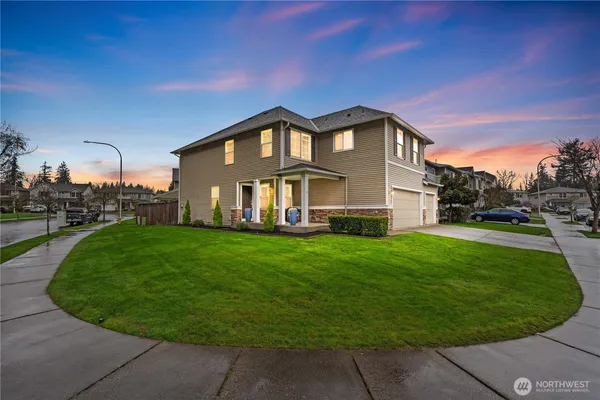 a house view with a garden space