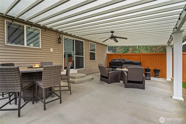 a table and chairs sitting in a patio