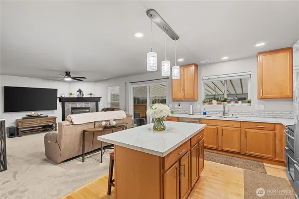 a view of a kitchen center island and windows