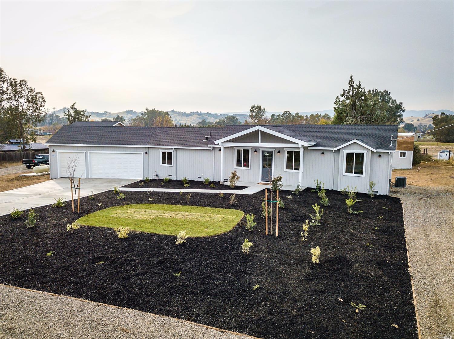 a view of a house with swimming pool and porch