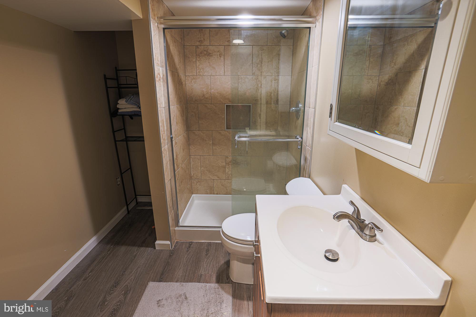 8343 Hillendale Road Baltimore, MD 21234 - Photo 29 of 35 a bathroom with a sink and toilet