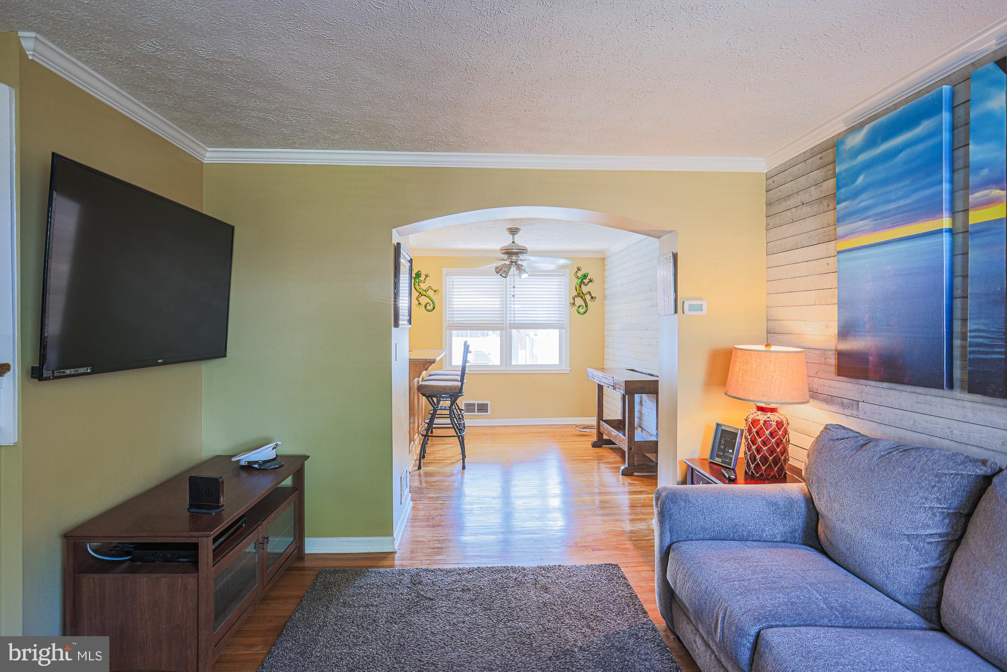 8343 Hillendale Road Baltimore, MD 21234 - Photo 6 of 35 a living room with furniture and a flat screen tv