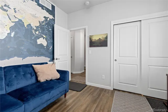 a bathroom with a sink mirror vanity and toilet