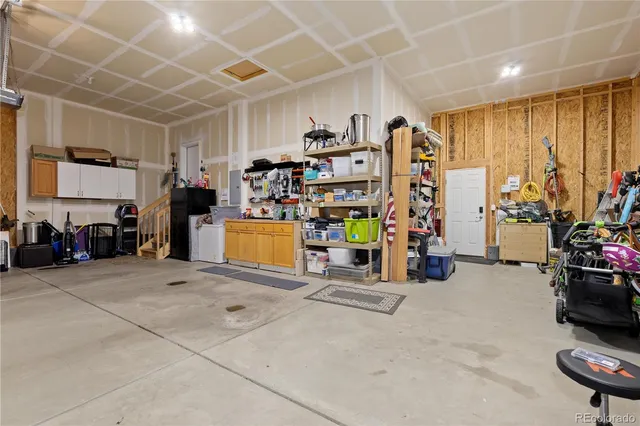 a view of a street with houses on both side