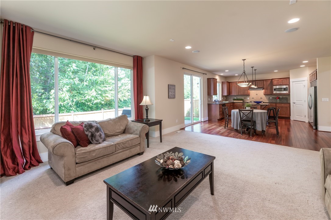 5204 Northeast 9th Place Renton, WA 98059 - Photo 13 of 33 a living room with furniture and a large window