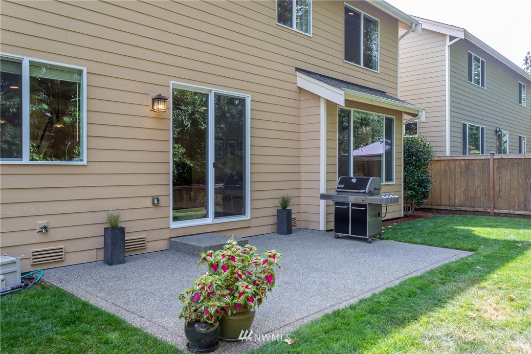 5204 Northeast 9th Place Renton, WA 98059 - Photo 15 of 33 a view of a house with a yard and a garden