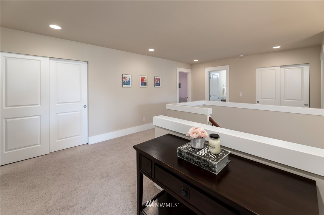 5204 Northeast 9th Place Renton, WA 98059 - Photo 29 of 33 a living room with furniture and a table