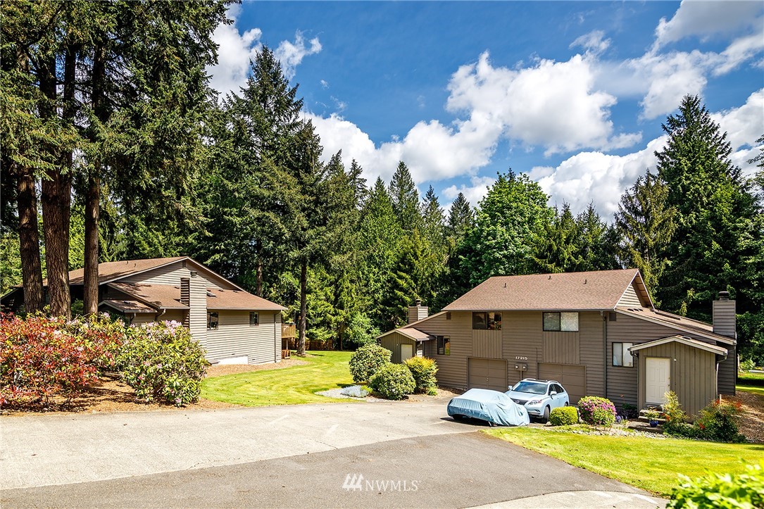 17215 Gravenstein Road Bothell, WA 98012 - Photo 3 of 13 a front view of a house with garden