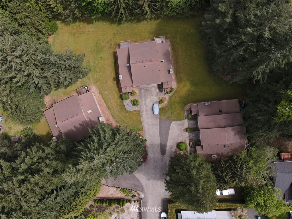17215 Gravenstein Road Bothell, WA 98012 - Photo 6 of 13 an aerial view of house with yard and lake view