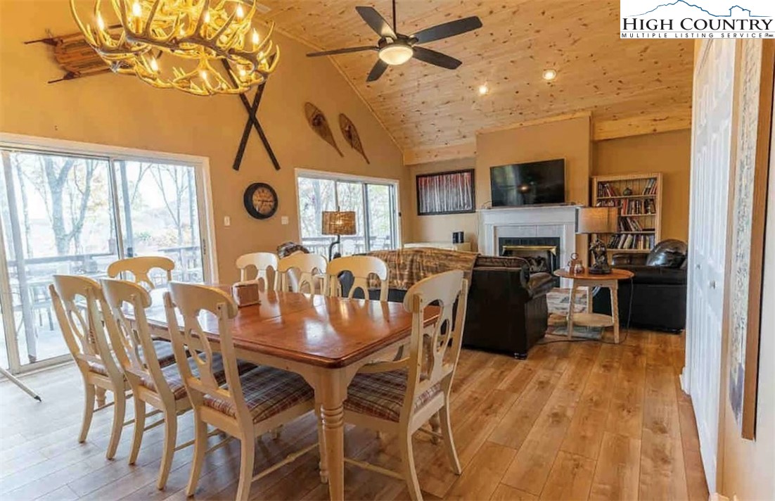304 St Andrews Road Beech Mountain, NC 28604 - Photo 1 of 33 a view of a dining room with furniture window and outside view