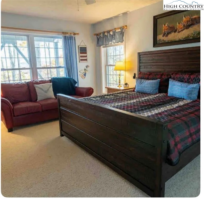 304 St Andrews Road Beech Mountain, NC 28604 - Photo 18 of 33 a living room with furniture and a window