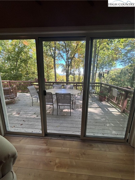 304 St Andrews Road Beech Mountain, NC 28604 - Photo 3 of 33 a view of room with floor to ceiling window and wooden floor