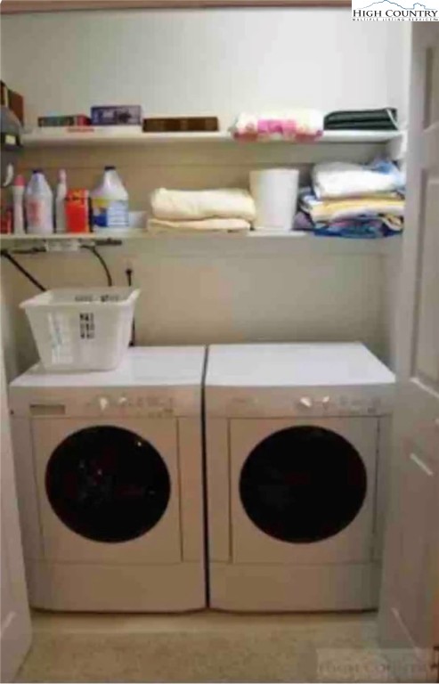 304 St Andrews Road Beech Mountain, NC 28604 - Photo 32 of 33 a utility room with dryer and washer